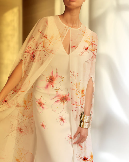 white soft kaftan with delicate flowers blooming