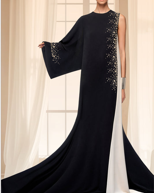Luxury black and white caftan with modern design, flowing silhouette, and elegant detailing.